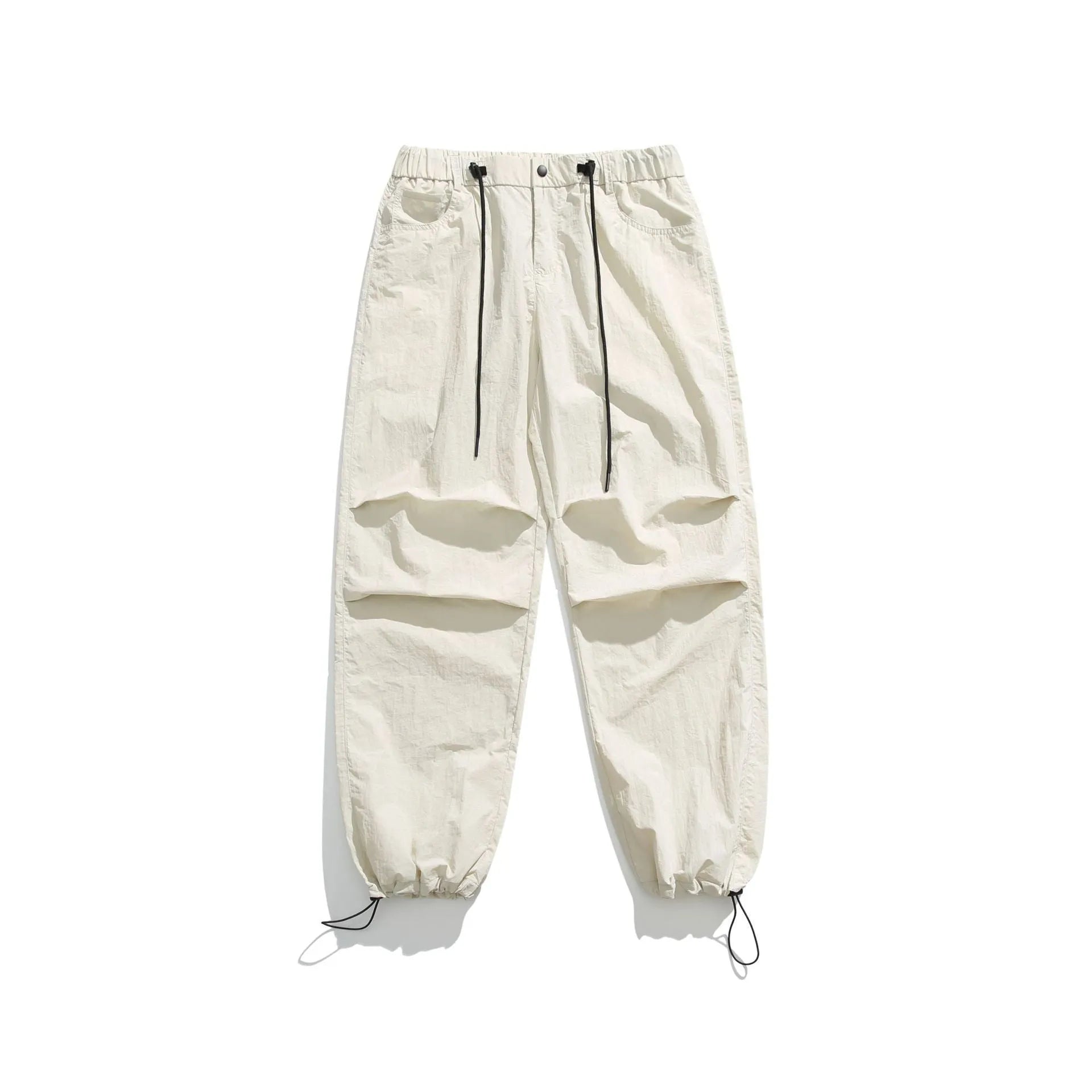 Man wearing loose straight-leg casual trousers in thin ice silk nylon fabric, showing apricot colour option.