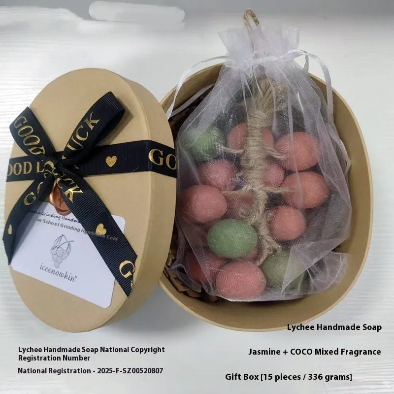 A 120g bar of handmade grape soap with options for black, green, purple, and litchi fragrance.