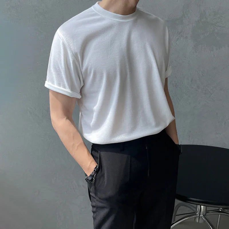 Men's slim fit cotton t-shirt in solid white colour showing round neck and half-length sleeves