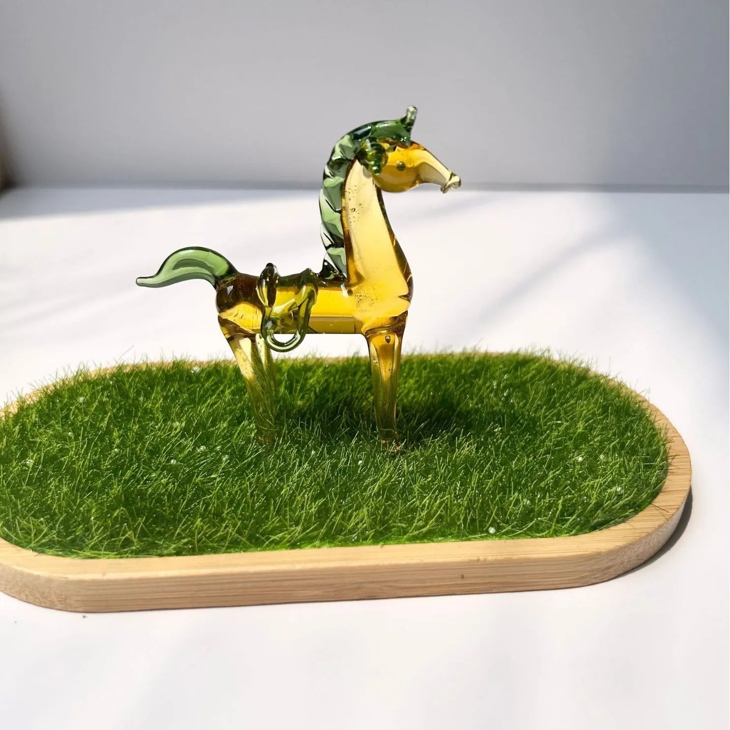 Brown glazed horse sculpture minimalist office decoration on wooden desk