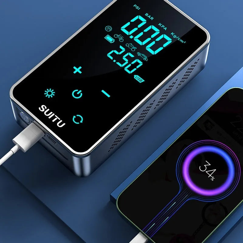 Compact black wireless car tyre pump with LCD screen displayed next to its hose, nozzles, and Type-C charging cable.