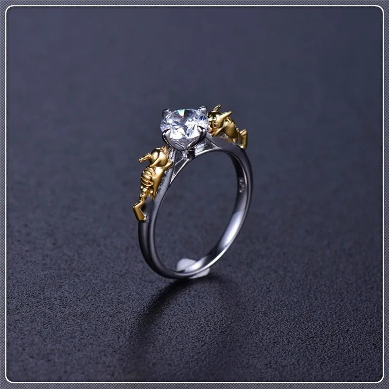Crown-shaped copper cosplay ring with black gold finish and crystal detail.