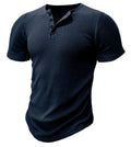 Man wearing a slim-fit solid colour polyester sports t-shirt in a muscle tee style.