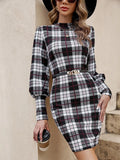Black tight-fitting midi dress with voluminous lantern sleeves and leather stitching detail
