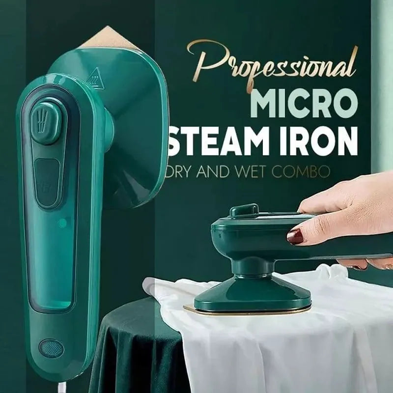 Handheld portable garment steamer in dark green with large titanium soleplate