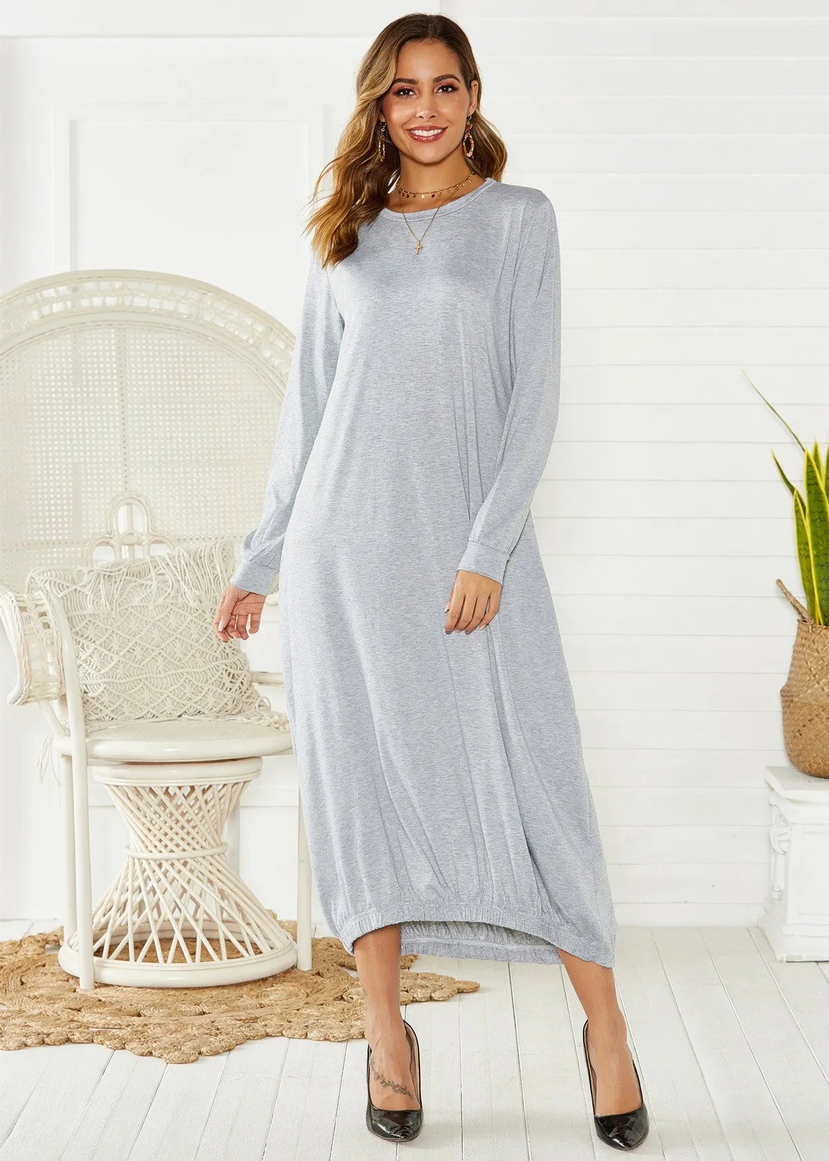 Black loose lace-up crew neck lantern dress with thread accents on hanger