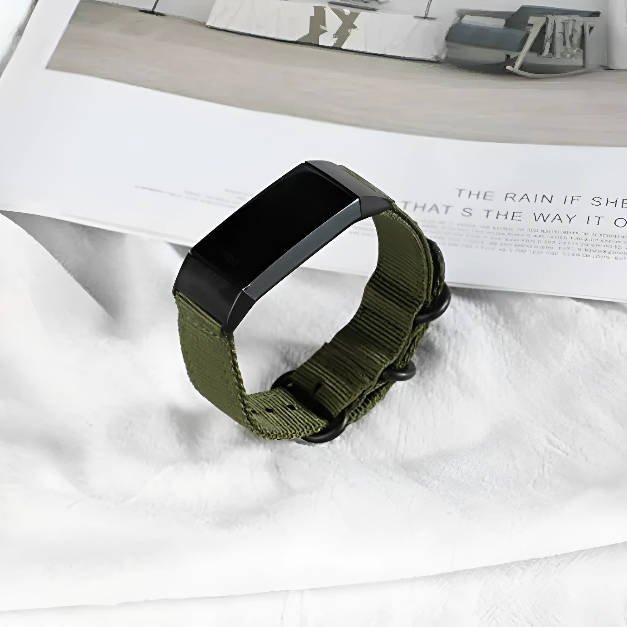 Nylon three-ring buckle replacement strap for Fitbit Charge fitness tracker in multiple colours.