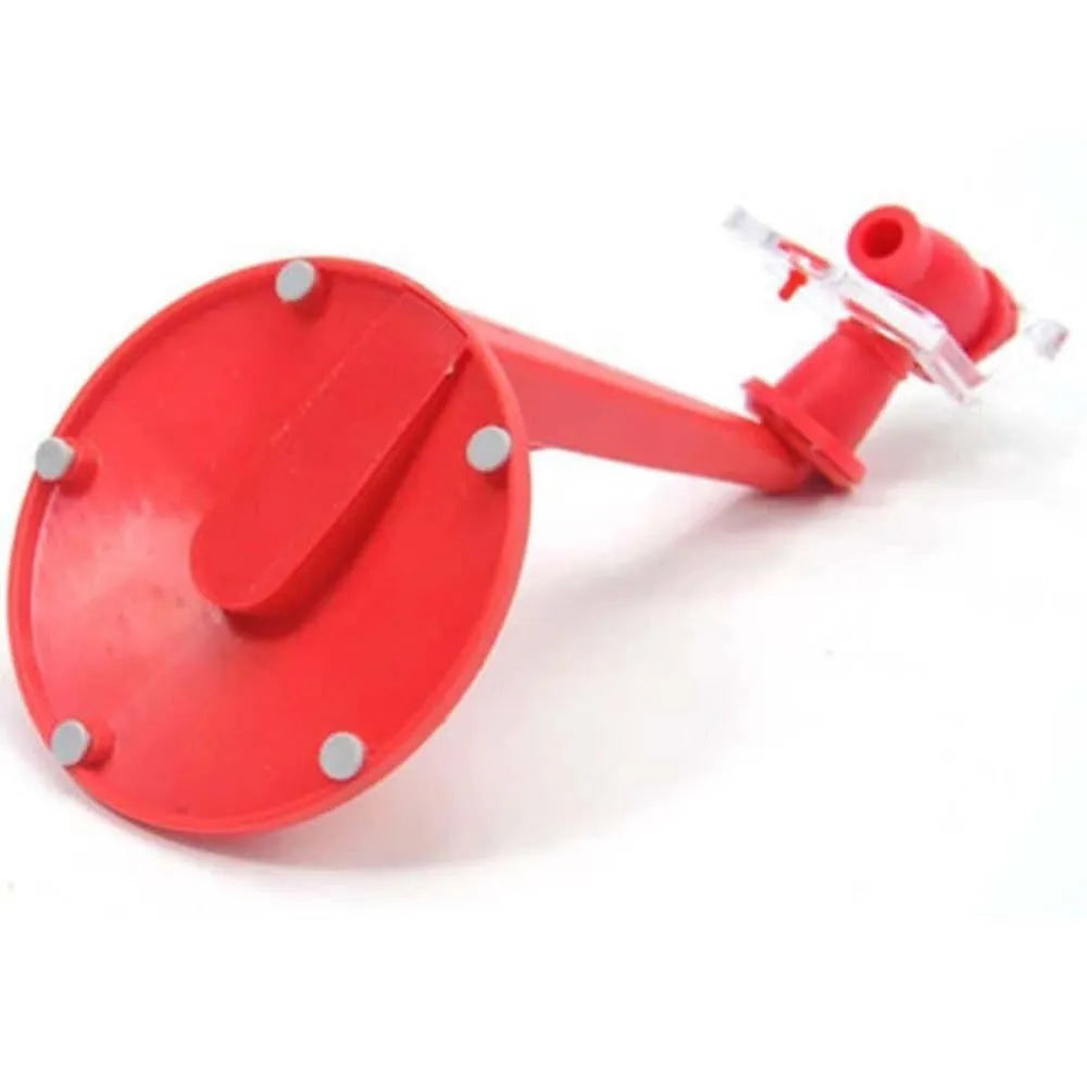 Red plastic Magic Tap soda dispenser attached to 2-litre bottle with push-button tap