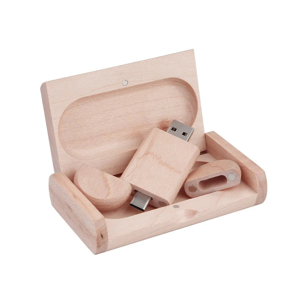 Maple wood carved USB flash drive with Type-C phone connector showing custom engraving