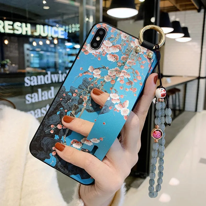 Rose flower patterned iPhone case with wrist strap attachment for iPhone models