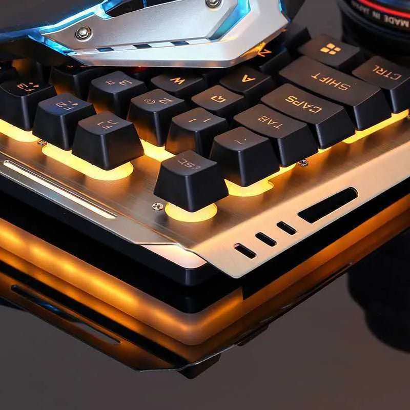 Wired gaming keyboard and mouse set with backlight and USB connection on desk