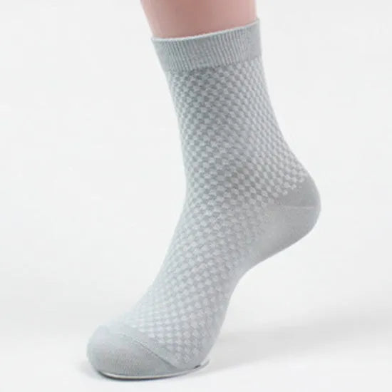 Men's bamboo fibre business socks with small square pattern, shown in colour options including black and navy blue.