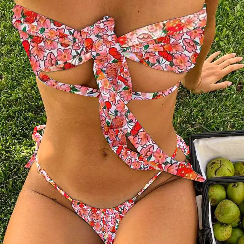 Women's lace-up front swimsuit with floral print and built-in chest pad