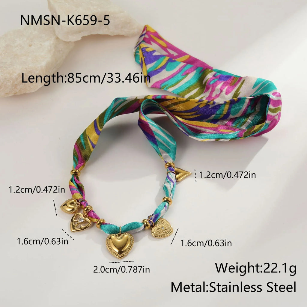 Women's stainless steel jewellery set with geometric pendant and gold plating