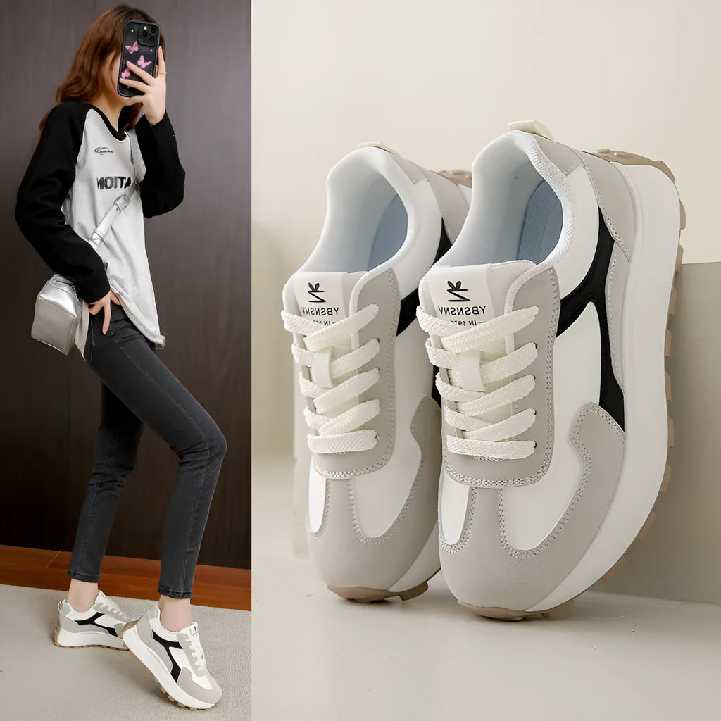 Women's solid-colour platform sneakers with mesh upper and flat rubber sole.