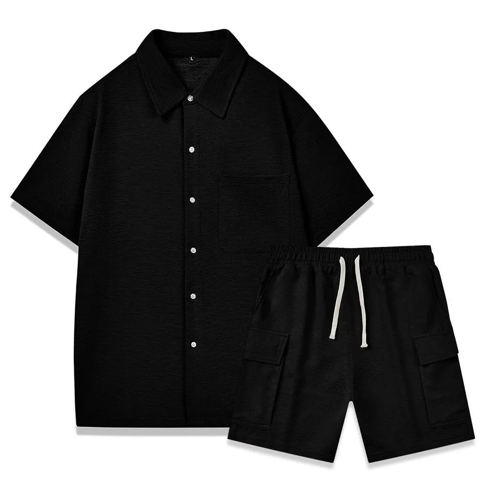 Beige polyester short sleeve top and elastic waist shorts two-piece set laid flat.