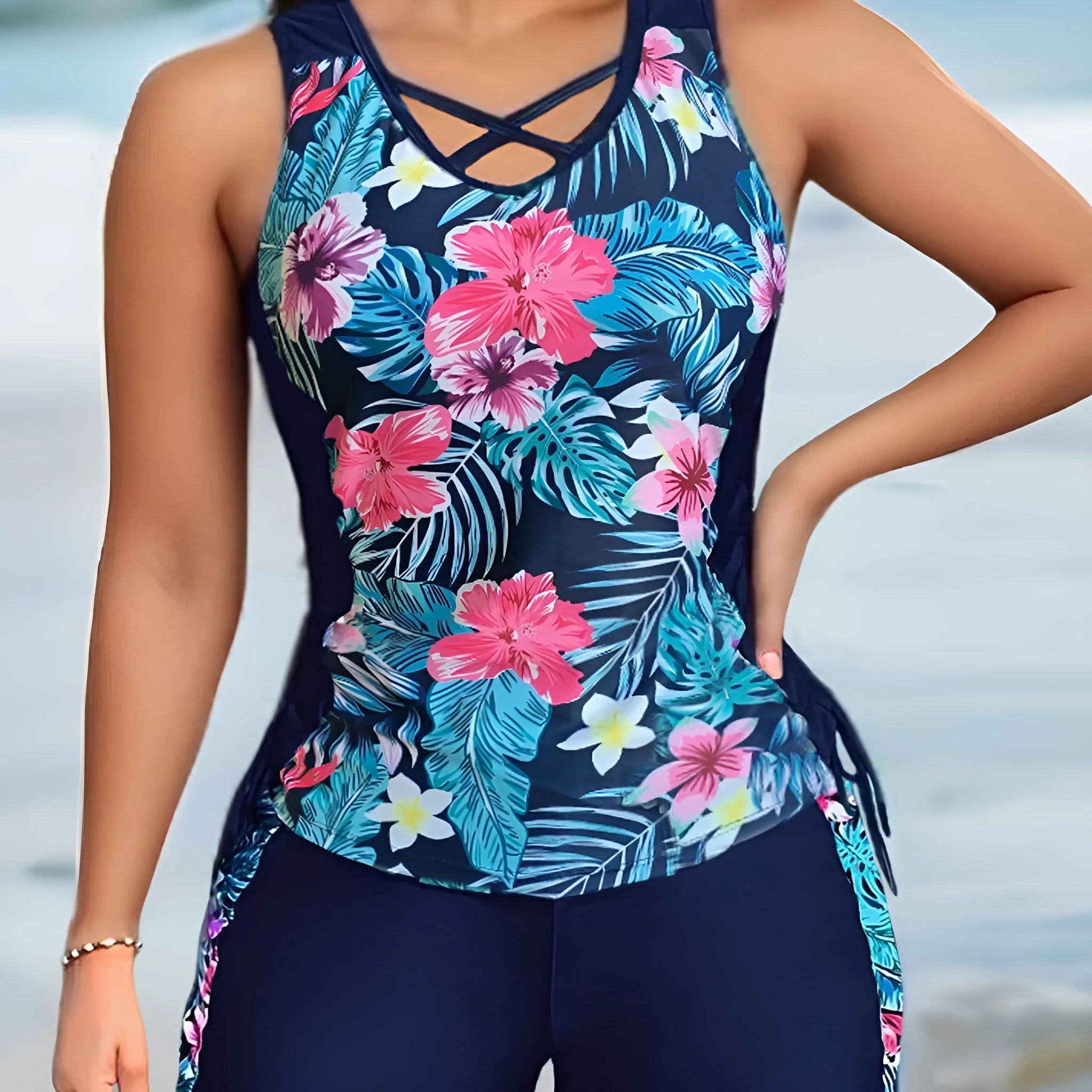 Plus size women wearing a floral printed high-waisted bikini in navy blue