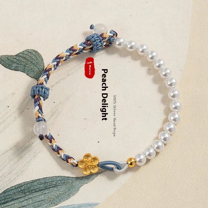 Peach coloured Chinese flower weaving carrying strap with sterling silver chalcedony and pearl decorations