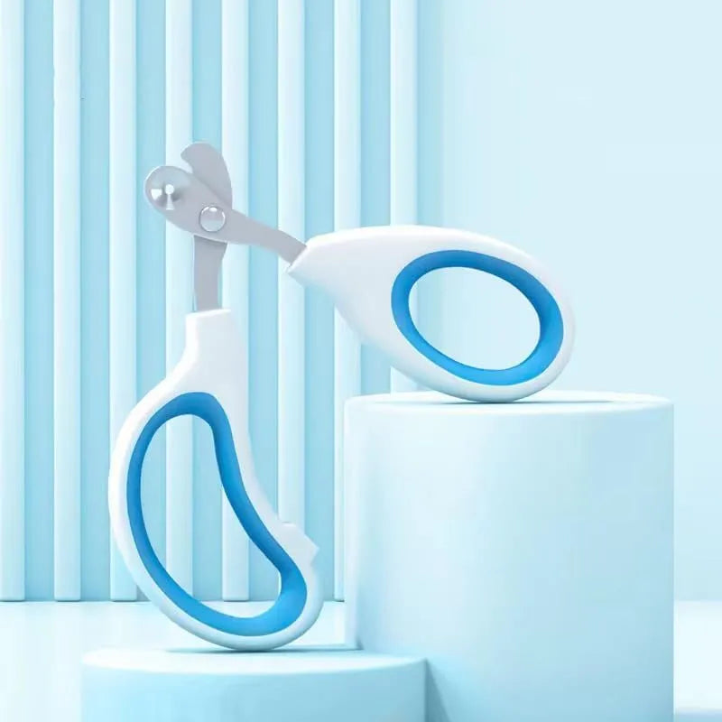 Cat nail clippers with circular hole design in blue, orange, and pink colours