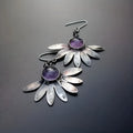 Purple resin bohemian flower statement earrings with animal zodiac design on alloy frame.