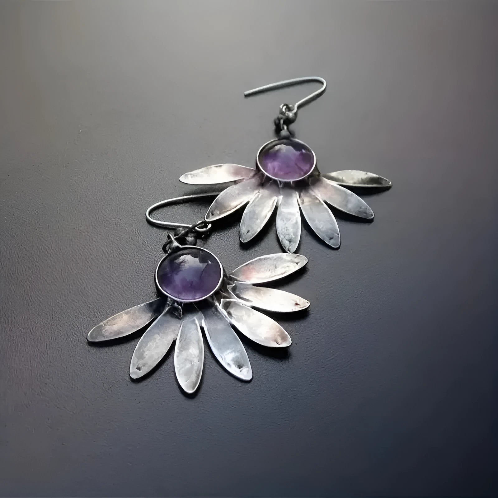 Purple resin bohemian flower statement earrings with animal zodiac design on alloy frame.