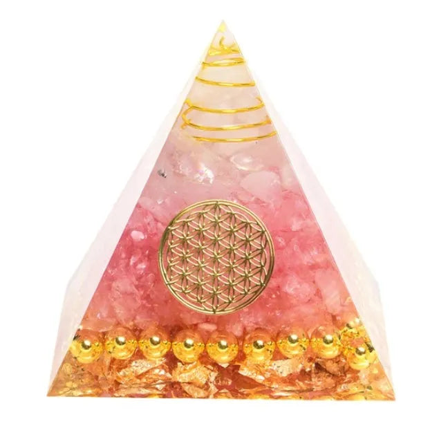 Clear epoxy resin pyramid ornament with embedded coloured crystal gravel inside, measuring 6cm.