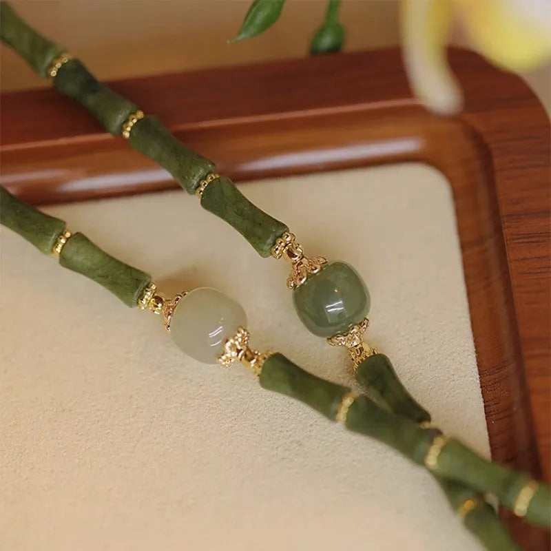 Traditional Hetian jade bamboo festival bracelet with geometric circular design in dark green or light colour options
