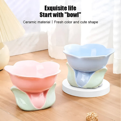 Blue floral patterned ceramic raised pet bowl with non-slip base for cats or small dogs.