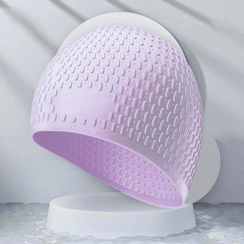 Adult silicone swimming cap with water drop design in various solid colours