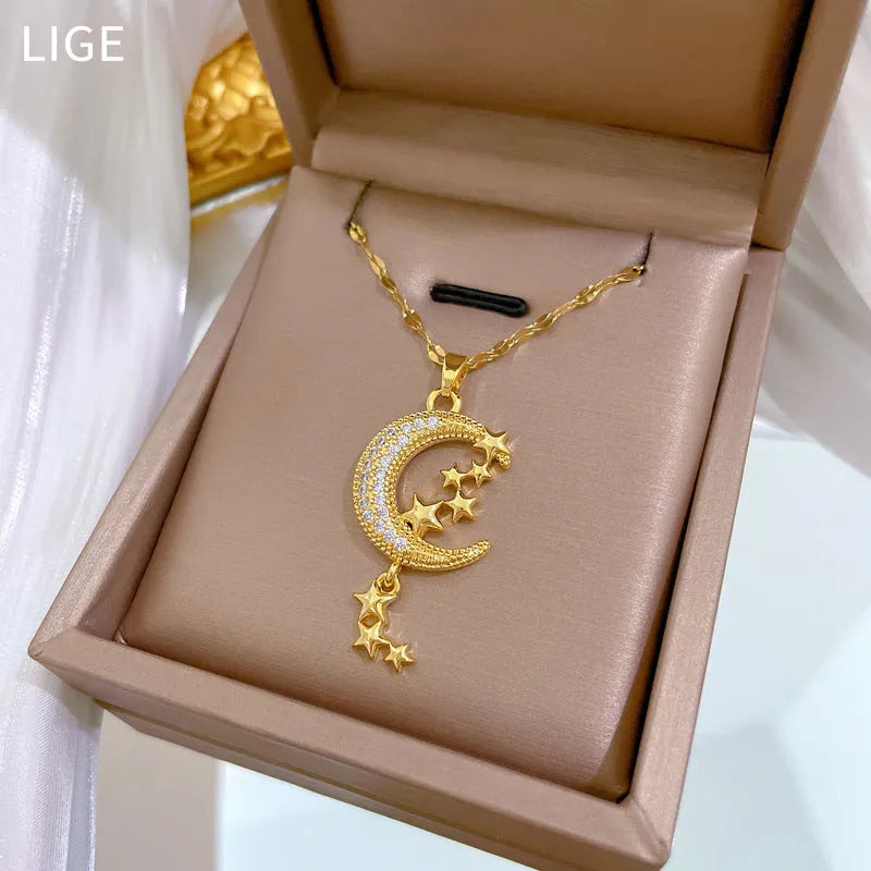 Silver tone necklace with moon-shaped copper pendant on stainless steel chain