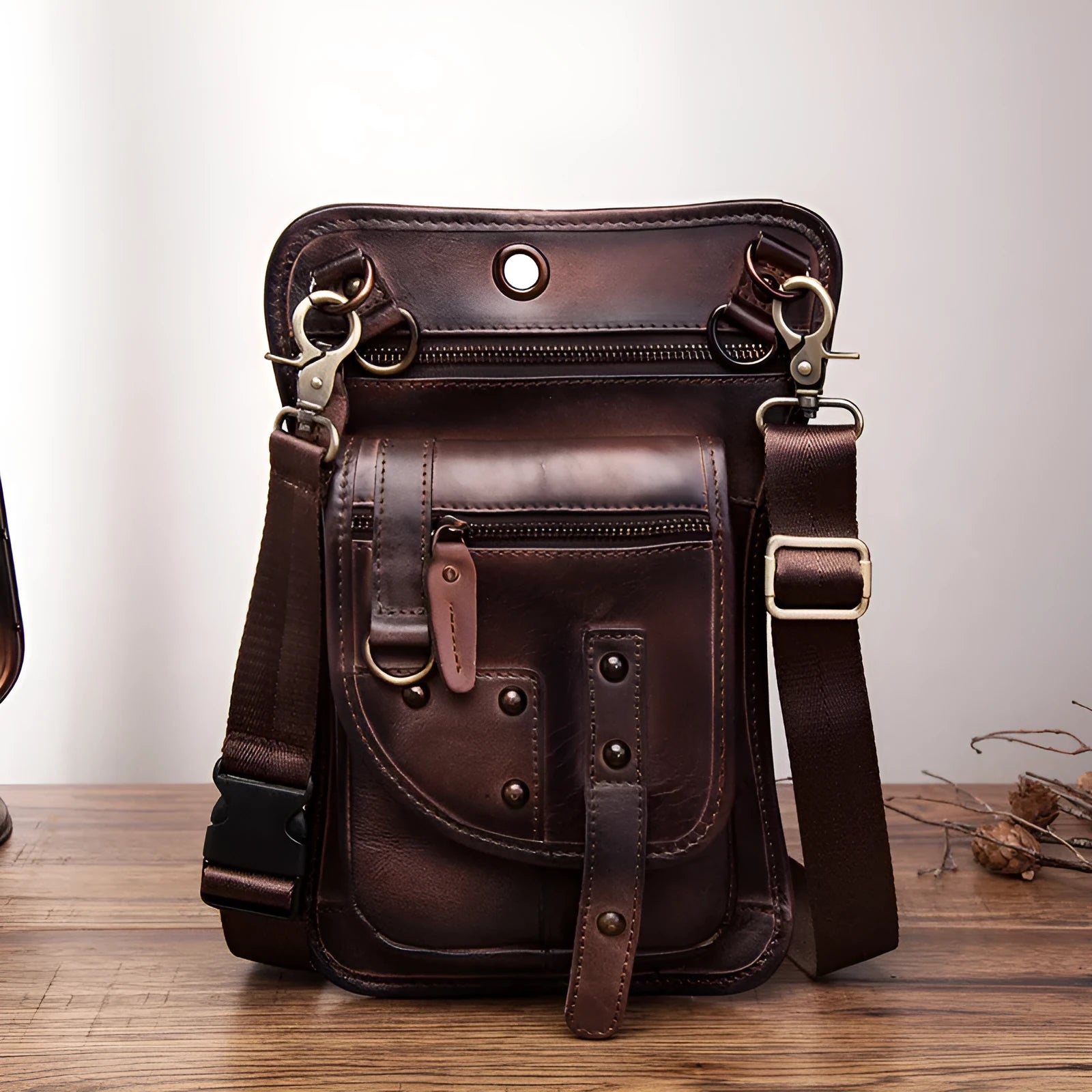 Genuine cowhide leather punk fanny pack with zipper closure showing internal phone and ID pockets