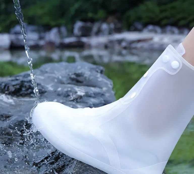 White high-top PVC reusable shoe covers for women, water resistant and anti-skid.