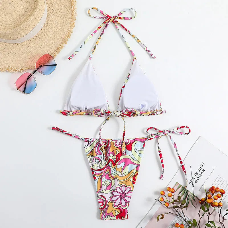 Women's triangle bikini swimsuit with hanging neck design and multicolour print