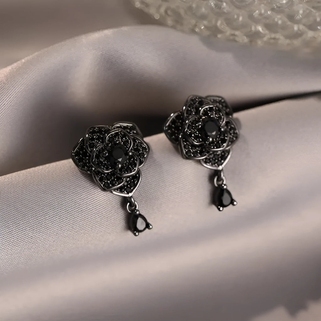 Women's rose gold plated flower ear studs with black zircon stones