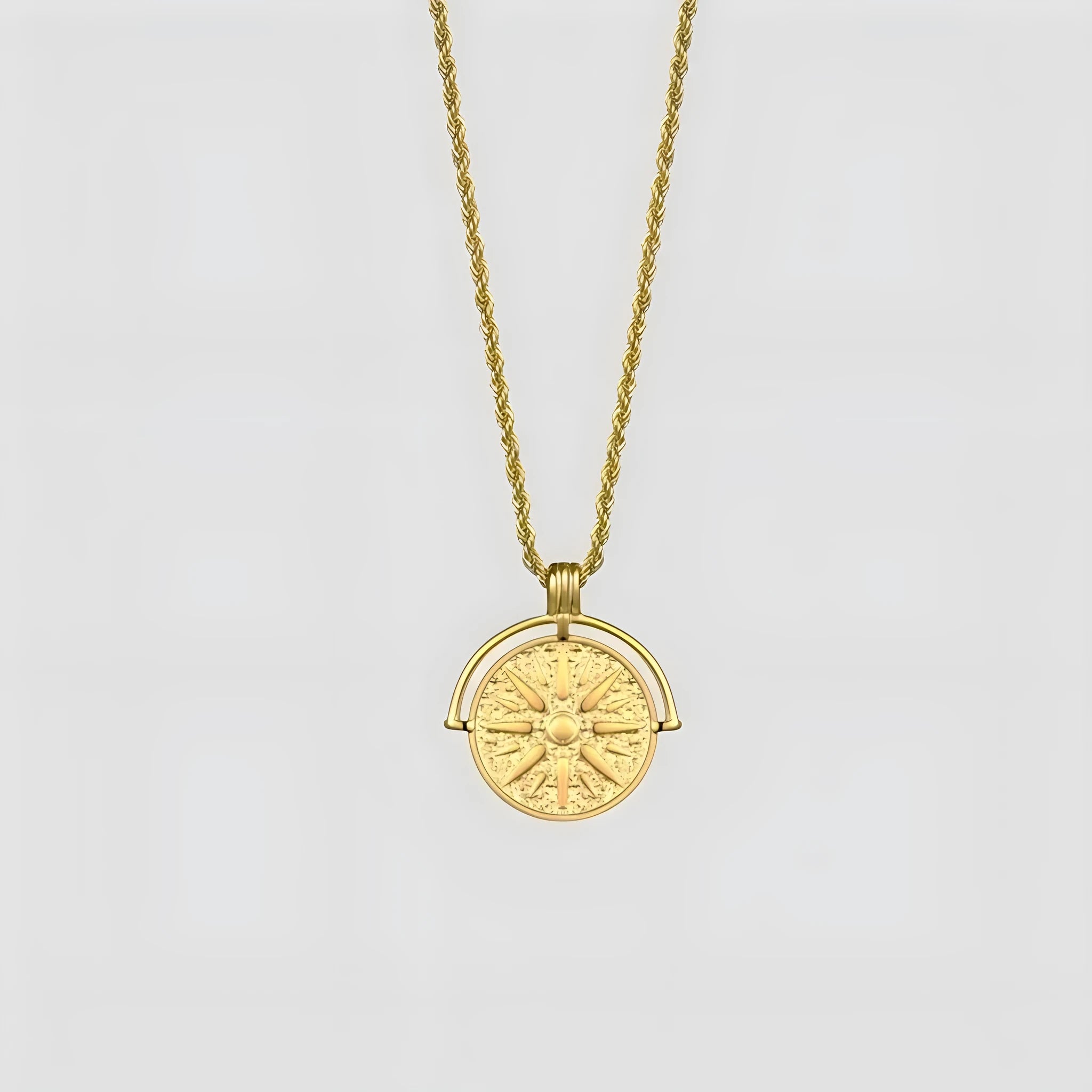 Gold titanium steel sunflower pendant necklace with geometric star embossing on adjustable hemp chain.