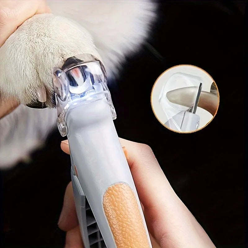 Yellow LED pet nail trimmer with magnifying glass and built-in nail catcher for cats and dogs.