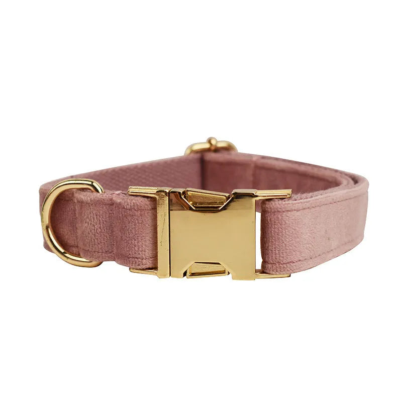 Light purple pink velvet dog collar set with leash and matching accessories on cloth material