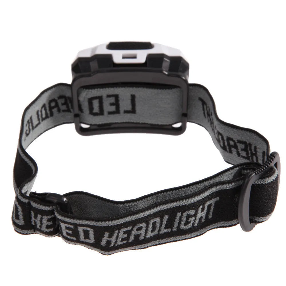 Black LED head torch with adjustable strap, showing white and red LEDs, for outdoor activities.
