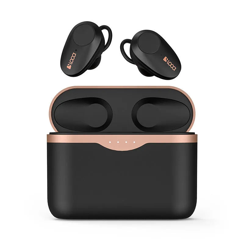 Black wireless Bluetooth headset with charging stand on a table