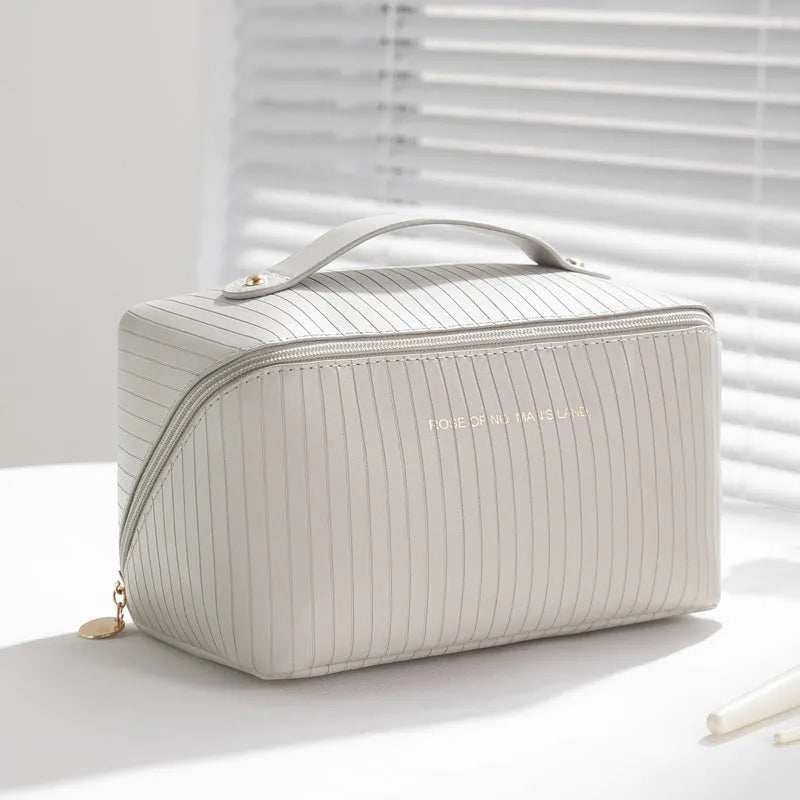 Vertical pattern cubic makeup bag in PU leather measuring 22.5 x 12.5 x 12.5 cm