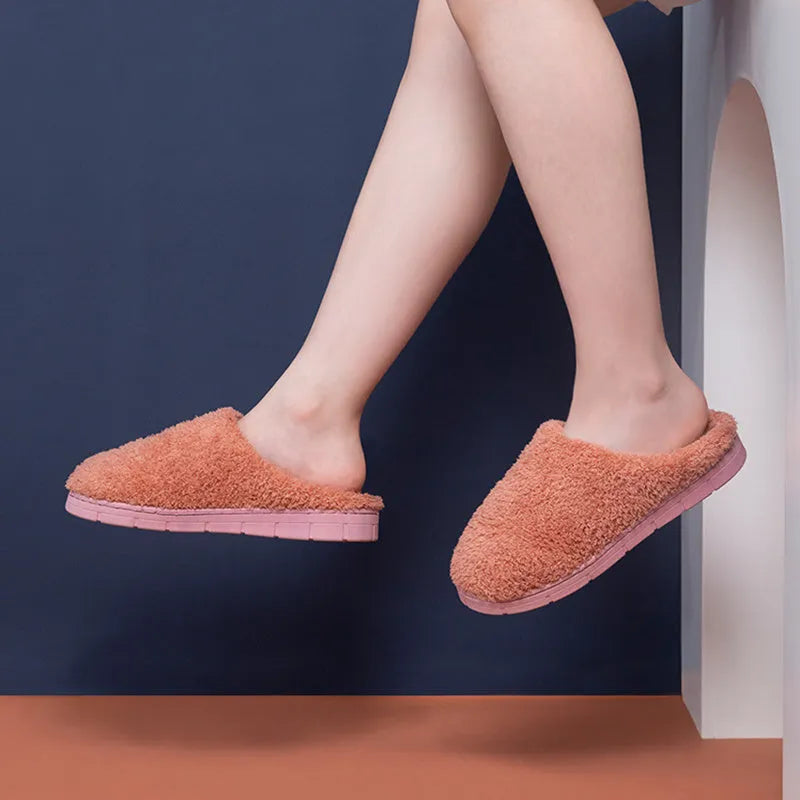 Women’s furry slippers with suede upper and non-slip sole in candy colours for winter home wear
