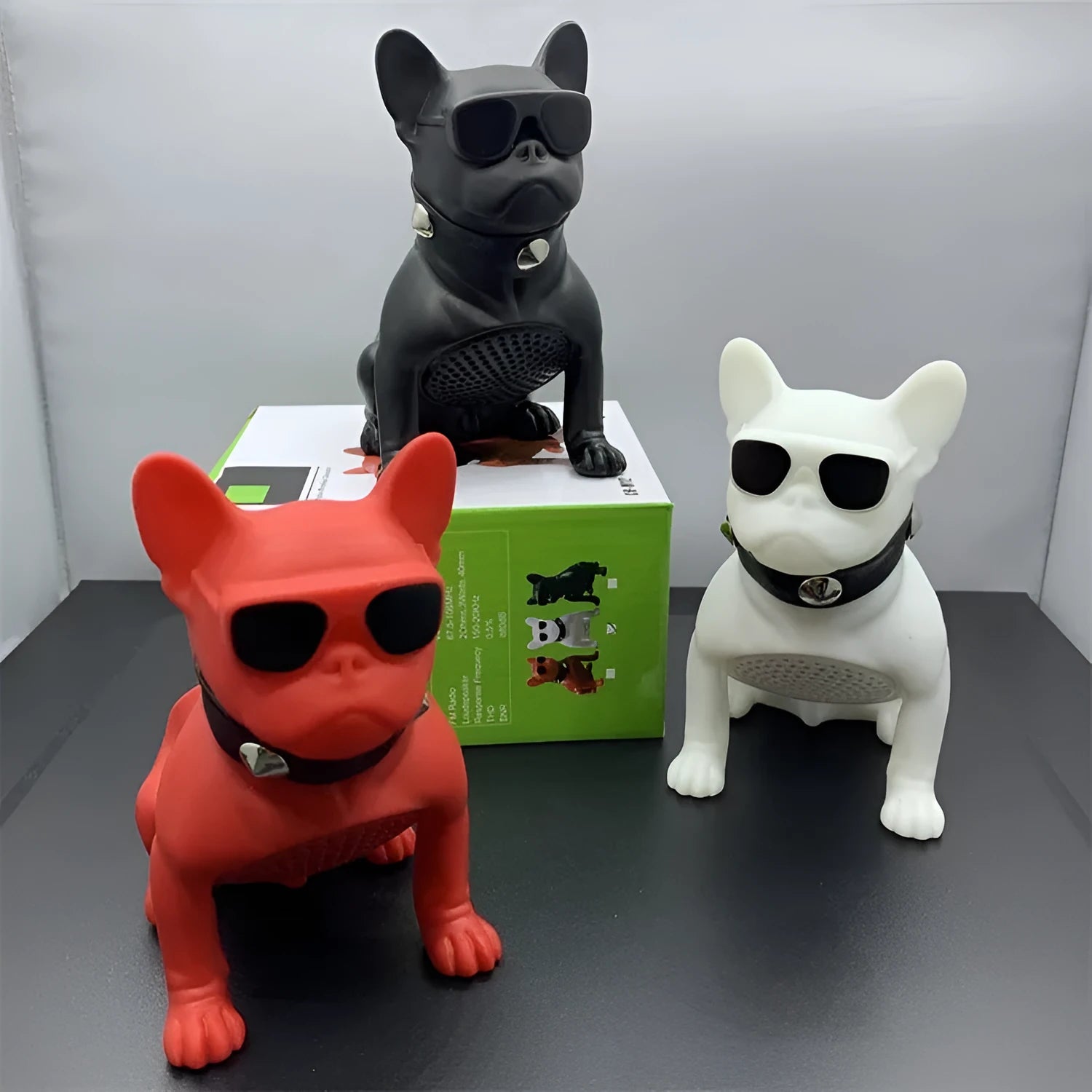 Mini bulldog-shaped Bluetooth speaker in black, red or white colours with wireless audio functionality