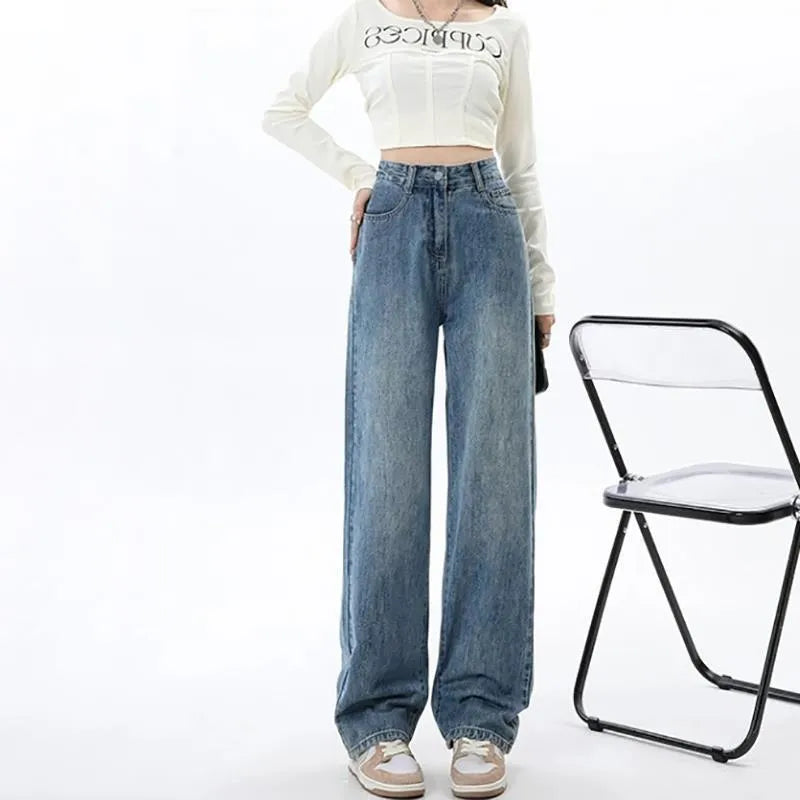 Women's retro blue wide leg jeans with high waist and straight cut on hanger