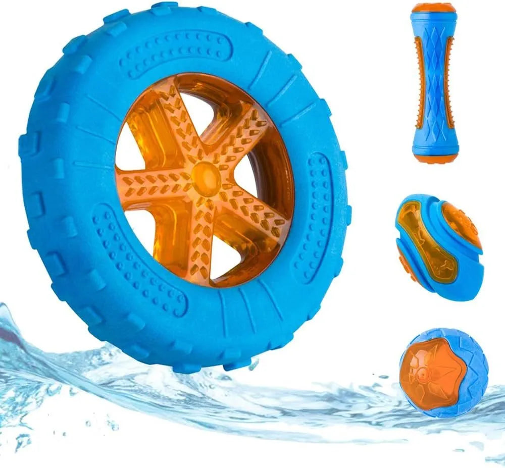 Set of three TPR dog toys: a blue squeaky ball, an orange barbell, and red tyres on grass.