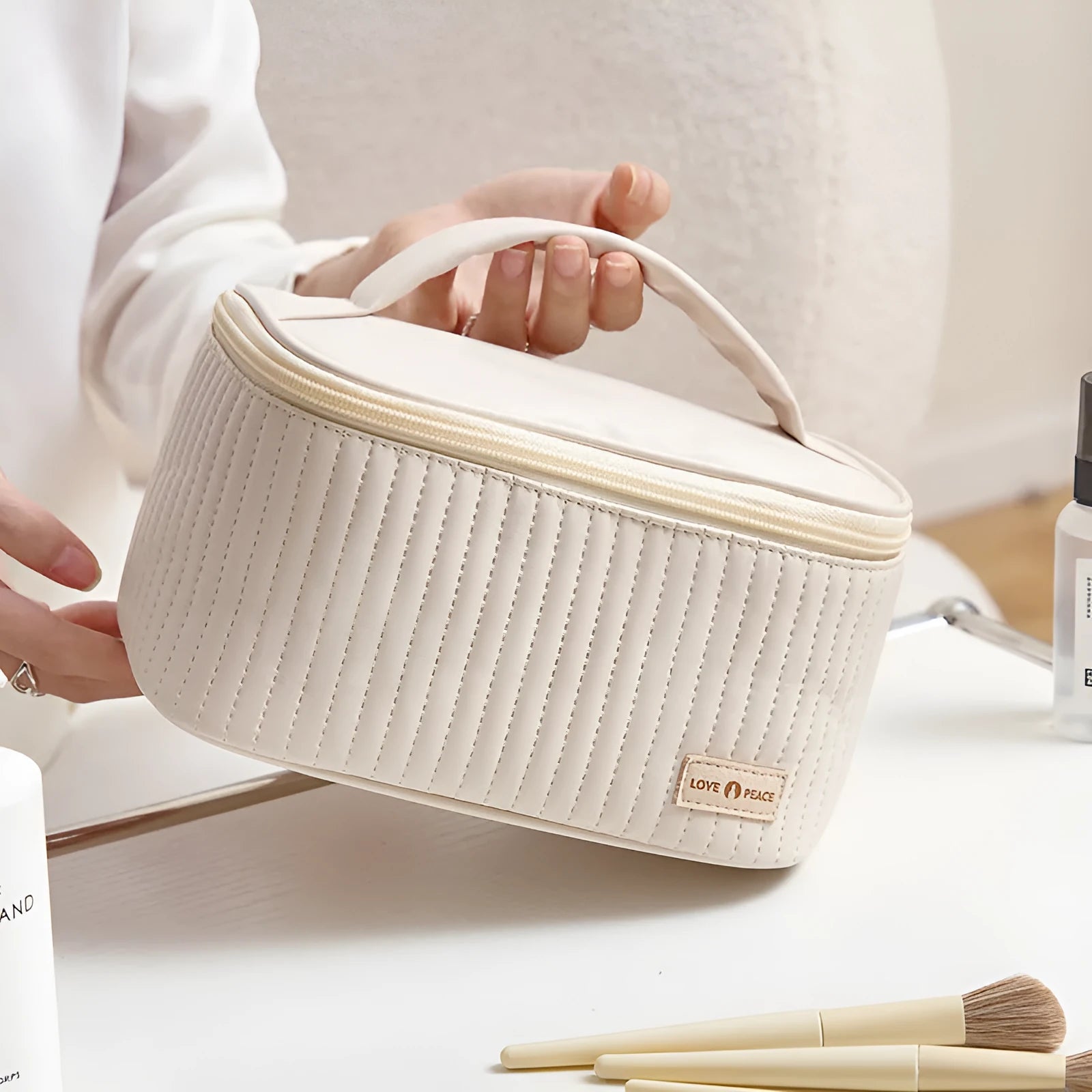Open-top PU leather makeup bag in a choice of six solid colours including pink, coffee, and light blue.
