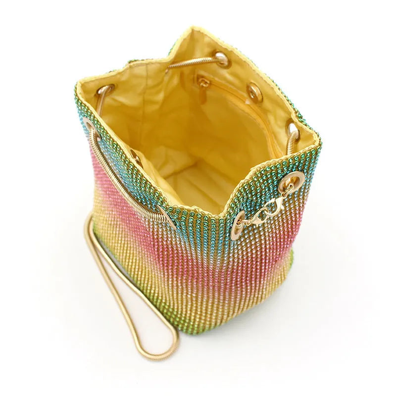 Rainbow multi-colour rhinestone bucket bag with diamond pattern design and soft fabric texture