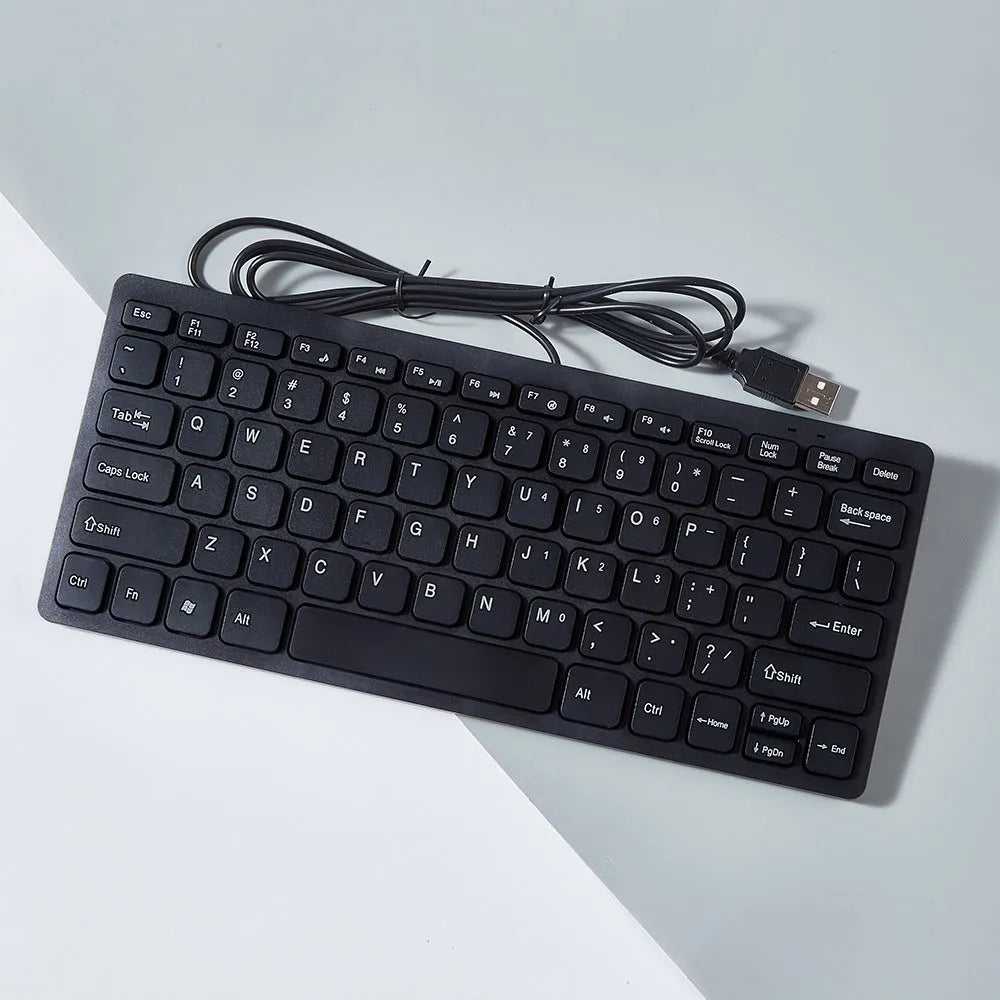 Compact USB wired keyboard in black, white, pink or blue colour with 1.3 metre cable