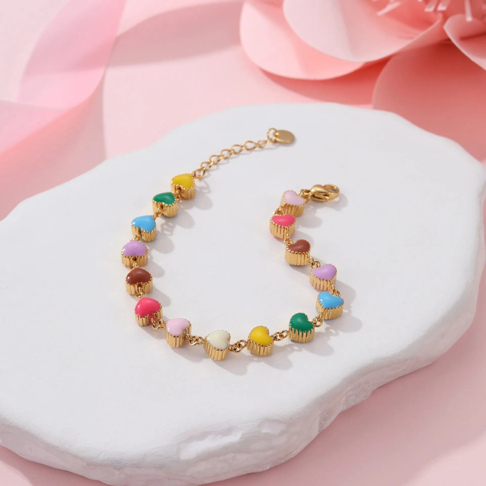 Gold or steel coloured heart-shaped titanium steel bracelet with electroplated finish for women's fashion wear