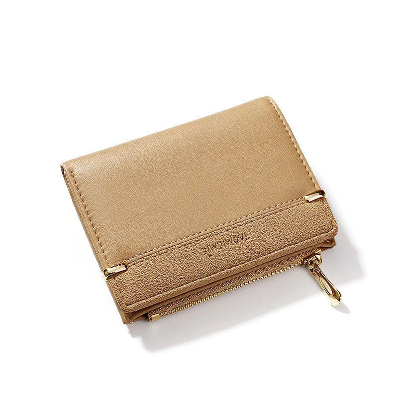 Ladies short zipper wallet in PU leather, open to show multiple card slots, bill holder, change slot, and hidden compartment.