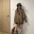 Women's triangular cashmere blend shawl cape with tassel detailing in various colours